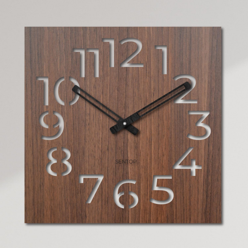 Elegante Holzwanduhr für ein modernes Interieur. Minimalistische Holzuhr mit markanten Ziffern.