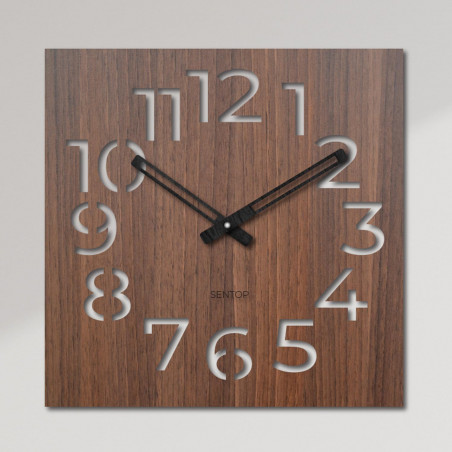 Elegante Holzwanduhr für ein modernes Interieur. Minimalistische Holzuhr mit markanten Ziffern.