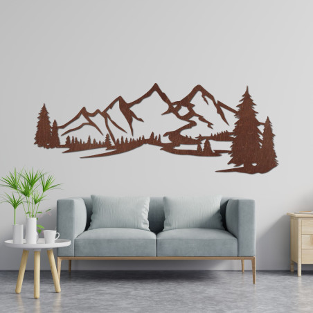 Schwarzes Panoramabild von Bergen und Wald über einem grauen Sessel im Wohnzimmer.