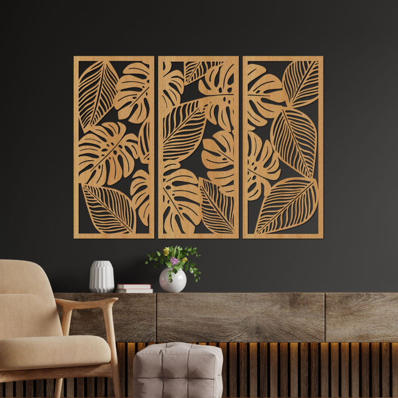 Verleihen Sie Ihrem Interieur mit unserem dreiteiligen Wandbild aus Holz mit Monstera-Motiv neuen Schwung.
