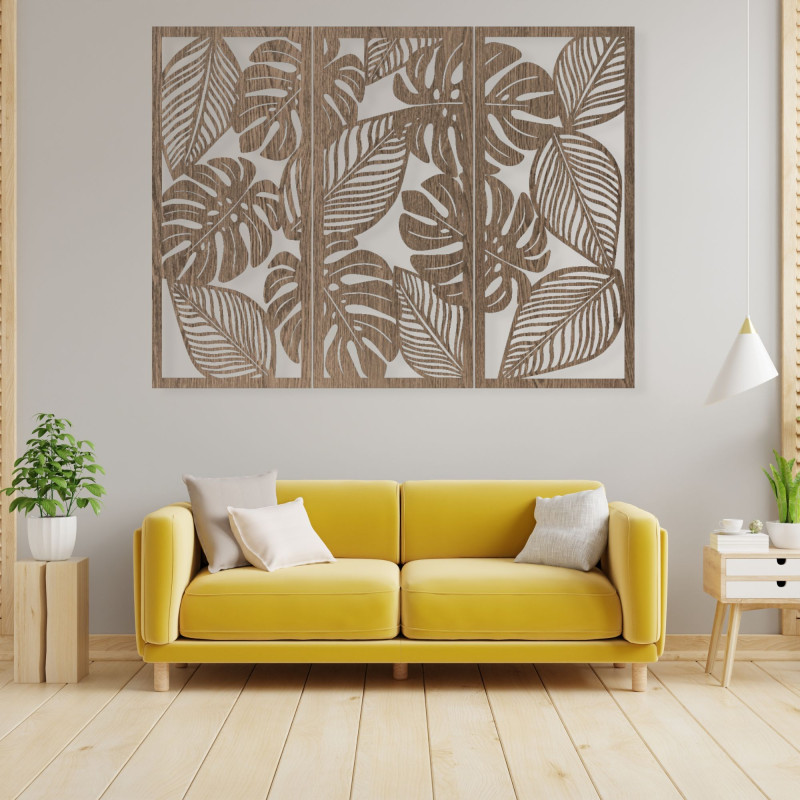 Verleihen Sie Ihrem Interieur mit unserem dreiteiligen Wandbild aus Holz mit Monstera-Motiv neuen Schwung.