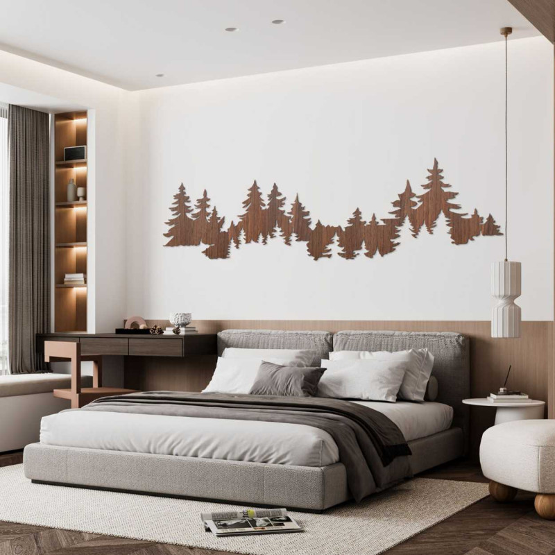 Nahaufnahme einer Waldsilhouette aus Holz, montiert auf einer weißen Wand.