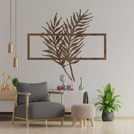 Wanddekoration aus Holz mit tropischen Blättern in einem modernen Rahmen