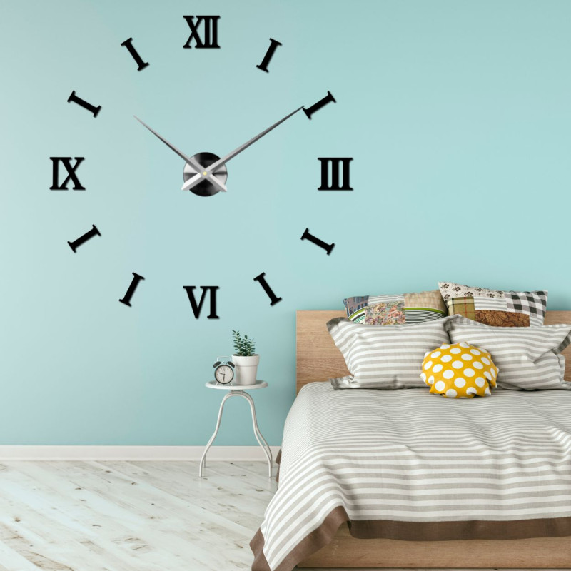 Eine minimalistische schwarze Uhr, die dank ihres 3D-Designs Ihrer Wand Tiefe und Stil verleiht.